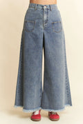 Hoge denim culotte met opgestikte zakken en rafelzoom