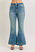 Flared spijkerbroek met vintage wassing en knoopdetail